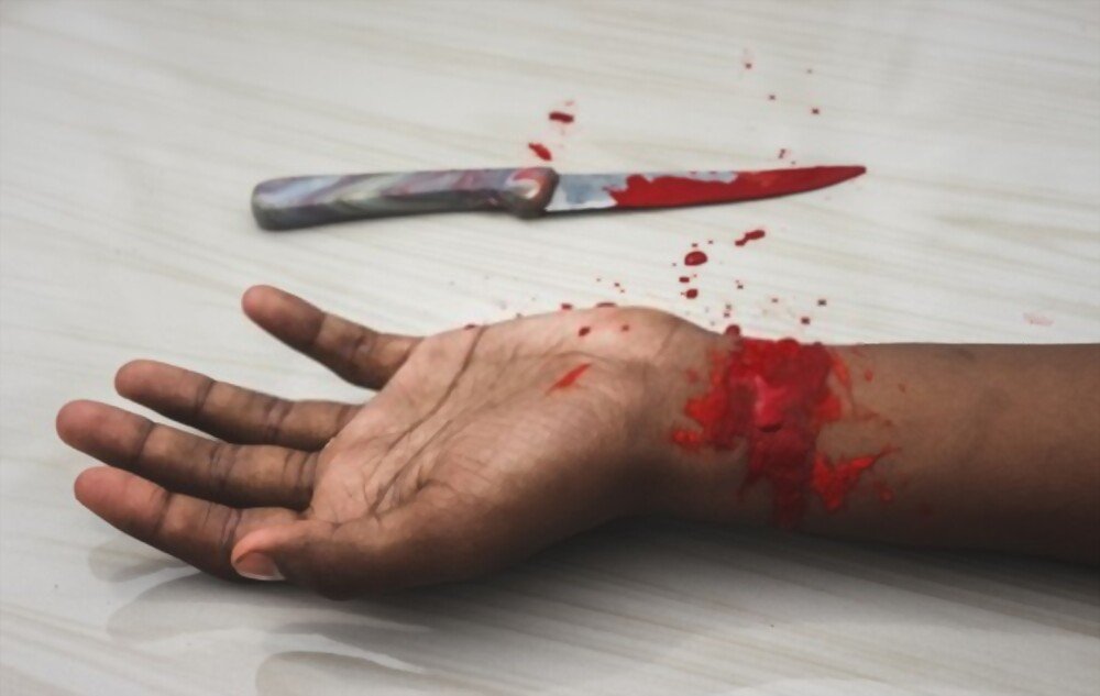 committed-suicide-concept-man-by-knife